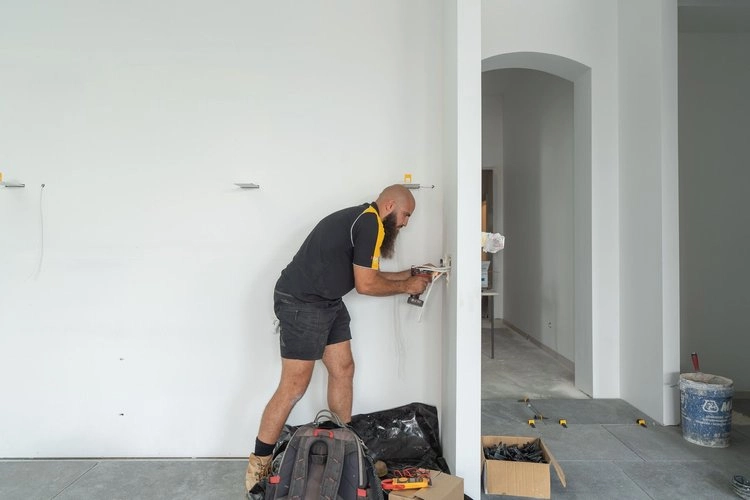 Flash-Electrical-SA-Worker-Drilling-2.webp